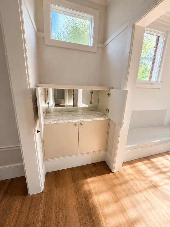 Concealed cabinet with marble benchtop