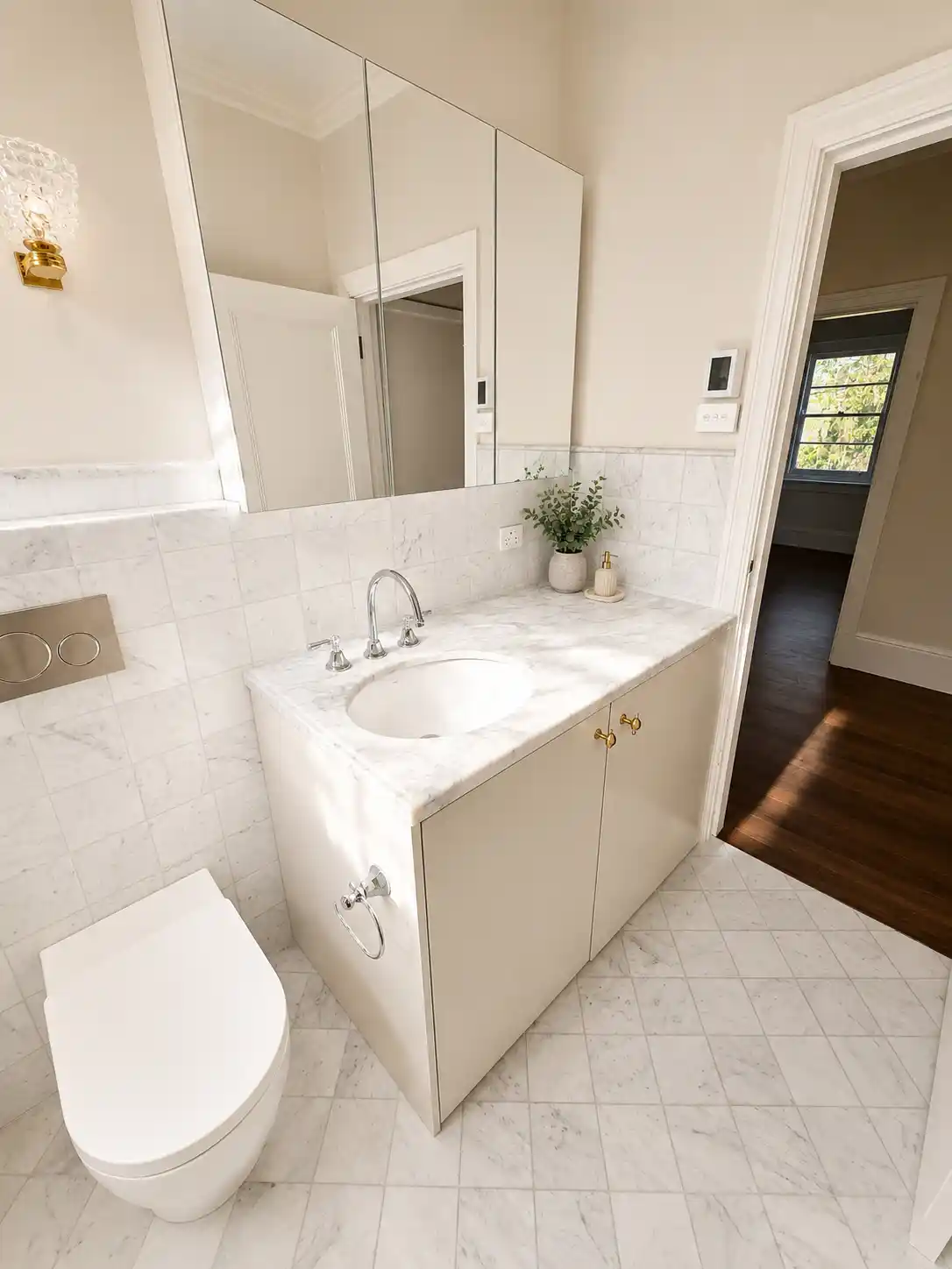 Marble-top vanity with chrome tapware